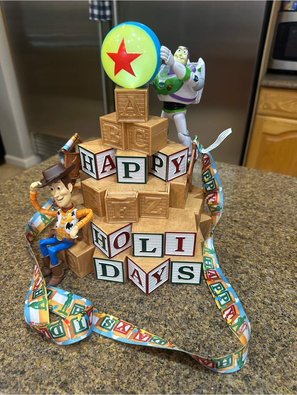 Toy Story Holiday Holidays popcorn bucket with Woody & Buzz.